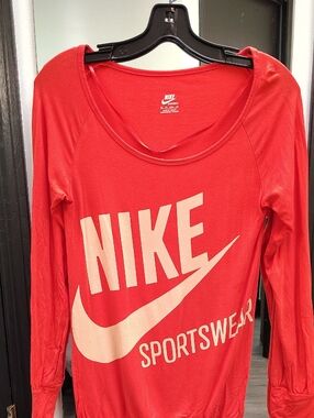 Nike Women’s Orange Long Sleeve Tee with White Swoosh & Sportswear Print